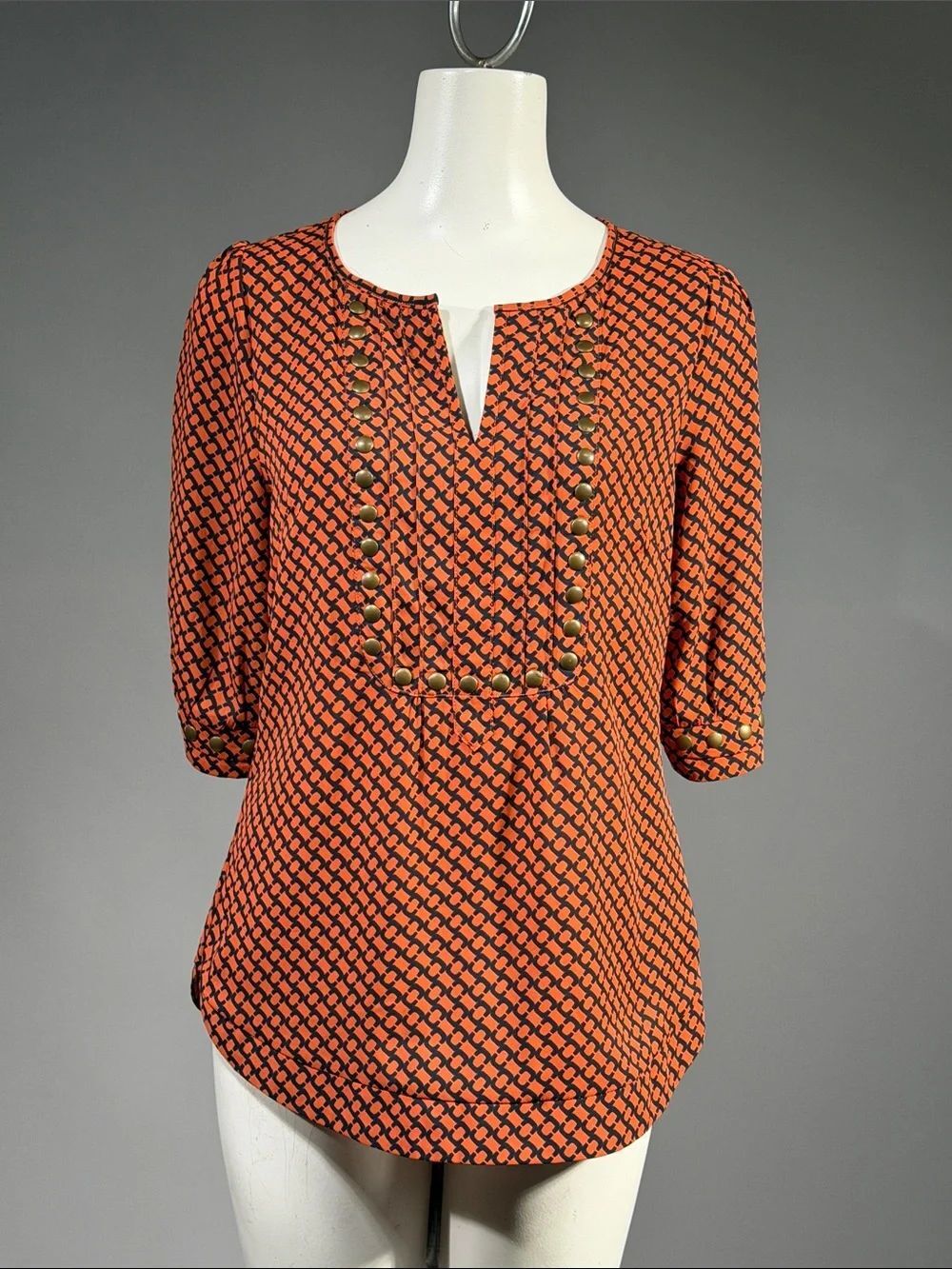 41 Hawthorn Orange and Black Geometric Stud-Accent Split-Neck Blouse (rack15t)